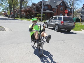 Paul Adair rides down Hincks Street in St. Thomas on his recumbent bike on Monday afternoon. A proposal has been made that the city be a stop on a province-wide cycling network. One route would go from St. Thomas to Lynhurst to London and another route would go from St. Thomas to Port Stanley. (Laura Broadley/Times-Journal)