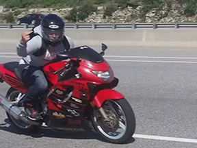 James Cole was sentenced on Monday to two years in a federal prison and banned from driving for another two years beyond that after admitting to being the motorcyclist who raced around Ottawa for several weeks last spring, flashing an imitation handgun at anyone who got in his way or dared to challenge him. -