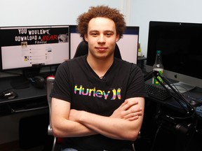 British IT expert Marcus Hutchins who has been branded a hero for slowing down the WannaCry global cyberattack, sits in front of his workstation during an interview in Ilfracombe, England, on Monday, May 15, 2017. (AP Photo/Frank Augstein)