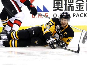Penguins star Sidney Crosby lays on the ice after being tripped during Game 2 of the NHL's Eastern Conference final on May 15, 2017, in Pittsburgh. The Ottawa Senators kept the frustrated Penguins captain off the scoresheet again. (BRUCE BENNETT/Getty Images)
