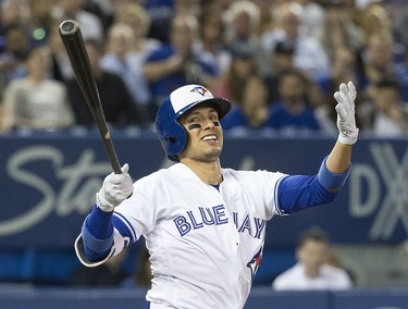 Ryan Goins swing and a miss before popping up in the 2nd inning, as the Toronto Blue Jays host the Atlanta Braves in Toronto, Ont. on Monday May 15, 2017. Stan Behal/Toronto Sun/Postmedia Network