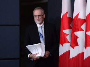 Auditor General of Canada Michael Ferguson holds a press conference at the National Press Theatre regarding the 2016 Fall Reports in Ottawa on Tuesday, Nov. 29, 2016. THE CANADIAN PRESS/Sean Kilpatrick