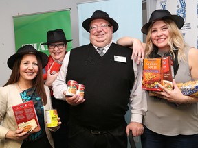 Jocelyn Filippini, left, president of the Rotary Club of Sudbury, Maureen Luoma, executive director of Downtown Sudbury, Dan Xilon, executive director of the Sudbury Food Bank, and Jaime Panas, honourary chair of Downtown Rotary Blues for Food, were at a media conference announcing details of the annual Downtown Rotary Blues for Food event in Sudbury, Ont. on Tuesday May 16, 2017. John Lappa/Sudbury Star/Postmedia Network