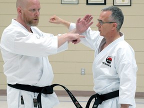 Scott Middleton Sensei, left, and Traditional Karate Ontario's Andy Horvath at the Tillsonburg Senior Centre on May 7. (Chris Abbott/Tillsonburg News)