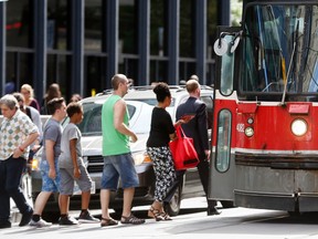 Because streetcars cannot be touched in politically correct downtown Toronto, the latest city/TTC, um, “plan” to reduce congestion on King is to chase away the cars with right turns — with the unintended but inevitable consequence of killing local businesses. (TORONTO SUN/FILES)