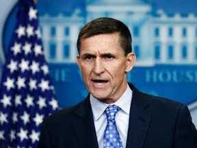 The White House is denying a report that Donald Trump asked James Comey to shut down an investigation into then-National Security Adviser Michael Flynn (pictured). (Carolyn Kaster/AP Photo/Files)