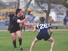 Hawk Rainen Schniefner attempts a pass to a teammate during a boys’ rugby game during the recent Star Trek Classic tournament. Stephen Tipper Vulcan Advocate