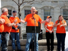 Brian Sutton, chair of the Kingston-Quinte Telus Ride for Dad, speaks on Tuesday in front of City Hall ahead of the event, which will take place on Saturday, May 27. (Amanda Norris/For The Whig-Standard)