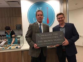 Mike Norris/The Whig-Standard
Phillip Brown, left, whose companies were major donors to At The Lake Cafe at the new Providence Care Hospital, and Ben Gooch of Voices Opportunities and Choices Employment Club, which operates the cafe, attended its grand opening on Tuesday.