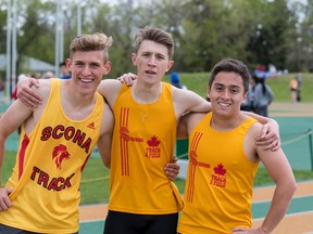 Celebrating their successes Tuesday in the Edmonton zone high school track and field championships are, left to right, Mark Webster, Scott Dixon and Jayden Buchanan. All three will be active June 2 and 3 in the provincial finals at Foote Field as part of a Strathcona Lords squad that habitually wins zone and regional titles before going on to challenge for top spot in the provincial showdown. Coach Chris Buffi and his numerous volunteer aides sent 106 participants into this competition. (Supplied)