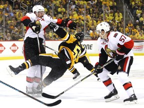 Dion Phaneuf of the Ottawa Senators checks Jake Guentzel of the Pittsburgh Penguins during Game 2 at PPG Paints Arena on May 15, 2017. (Bruce Bennett/Getty Images)