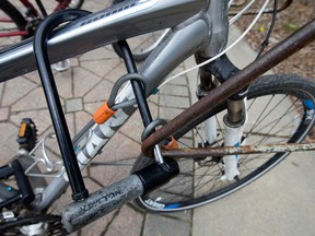 A bicycle is locked to a bike rack with a U-lock at the University of Alberta, in Edmonton Tuesday May 16, 2017. Photo by David Bloom