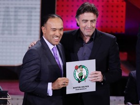 NBA deputy commissioner Mark Tatum (left) and Boston Celtics co-owner Wyc Grousbeck at the draft last night. (AP)