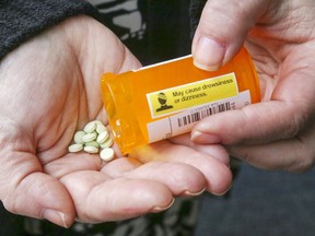 A Belleville mother holds her teenage daughter's post-surgery hydromorphone pills January 26, 2017. (Luke Hendry/Postmedia Network)