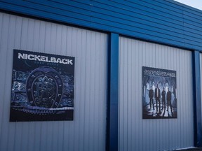 Murals of home town band Nickleback adorn the curling rink in Hanna, Alta., Tuesday, Dec. 13, 2016. Love 'em or hate 'em, chances are you at least know their name. "Every memory of lookin' out the back door/I have the photo album spread out on my bedroom floor/It's hard to say it/Time to say it/Goodbye, goodbye." Yes. It's Nickelback, that Nickelback. THE CANADIAN PRESS/Jeff McIntosh