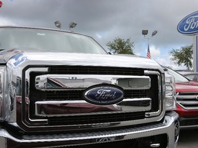 Ford vehicles are seen on a dealership’s lot on May 16, 2017 in Miami. (Joe Raedle/Getty Images)