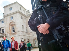 A firearms officer from the the British Metropolitan police stands guard near Horse Guards Parade in central London on April 29, 2017. (NIKLAS HALLE/Getty Images)