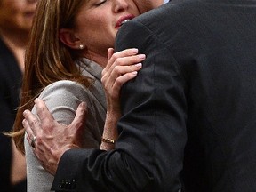 Interim Conservative leader Rona Ambrose and Prime Minister Justin Trudeau embrace during farewell speeches to Ambrose in the House of Commons on Parliament Hill in Ottawa on Tuesday, May 16, 2017. THE CANADIAN PRESS/Sean Kilpatrick