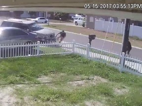 Surveillance video shows an out of control SUV headed towards a 14-year-old boy riding a bike. The teen walked away with minor injuries after being hit by the vehicle. (Screengrab/FOX 13 - Tampa)