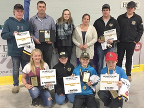 The inaugural Brandon Metske Heart and Soul Defense Award was given to a defence player from Novice Rep to Midget Rep who played with Heart and Soul. The award was received by Novice Rep Graydon McNee, Atom Rep Justin Rintoul, Peewee Rep Raelyn Pennington-Fritz, Bantam Rep Dustin Pennington-Fritz, and Midget Rep Lucas Angst, and presented by the Metske Family. Back L-R: Dustin Pennington-Fritz , Mike Metske, Megan Metske, Tina Metske, Lucas Angst, and Colton Metske. Front: Raelyn Pennington-Fritz, Andrew Metske, Justin Rintoul, and Graydon McNee.