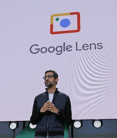 Google CEO Sundar Pichai talks about Google Lens which lets you point your phone's camera at places and objects to get information about them, during the keynote address of the Google I/O conference, Wednesday, May 17, 2017, in Mountain View, Calif. (AP Photo/Eric Risberg)