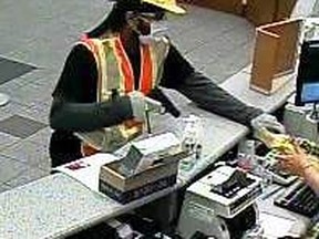 Security footage of a man suspected of six robberies. (POLICE/HANDOUT)