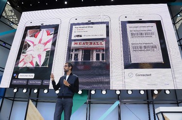 Google CEO Sundar Pichai talks about Google Lens and updates to the Google Assistant during the keynote address of the Google I/O conference, Wednesday, May 17, 2017, in Mountain View, Calif. (AP Photo/Eric Risberg)