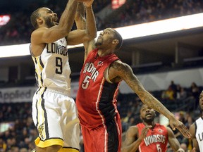 London Lightning guard Akeem Scott drives on Windsor Express forward Brandon Robinson during a National Basketball League of Canada game at Budweiser Gardens on Sunday. The teams square off in Windsor on Thursday. (MORRIS LAMONT, The London Free Press file photo)