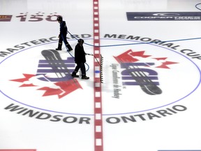 Workers prepare the ice for the Memorial Cup tournament at the WFCU Centre in Windsor. The Canadian major junior championship tournament kicks off Friday with the host Spitfires playing the Saint John Sea Dogs. (JASON KRYK/Windsor Star)