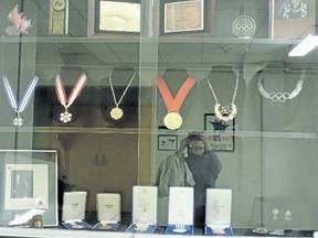 Bob Steadward’s medals are seen in a display case. Five of his most treasured medals were stolen last week. (SUPPLIED)