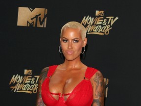 Model Amber Rose arrives for the 2017 MTV Movie & TV Awards at the Shrine Auditorium in Los Angeles May 7, 2017. (AFP PHOTO/JEAN-BAPTISTE LACROIX)