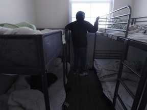 Mohammed, from Ghana and who did not want to be identified, is photographed in an apartment he shares with five other men from Africa in Winnipeg, Tuesday, February 14, 2017. He is seeking asylum after walking across the Manitoba border. Bundled against bone-chilling cold, asylum-seekers hoping to gain refugee status in Canada have been trudging through ditches and fields along the border with the United States. (THE CANADIAN PRESS/John Woods)