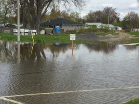 DAVE VACHON/The Intelligencer
Do not swim in flooded areas like this on South George St. There's sewage in the water.