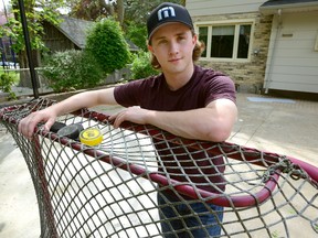 Johnny Warren at his backyard hockey rink in west London where he learned to play the game. Warren suffered an injury playing with the Saint John Sea Dogs and will not be able to compete with the team in the upcoming Memorial Cup. (MORRIS LAMONT, The London Free Press)