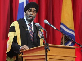 Minister of National Defence Harjit Sajjan gives the chancellor’s address at the Royal Military College of Canada’s convocation in Kingston, Ont. on May 18, 2017. Steph Crosier, Kingston Whig-Standard, Postmedia Network