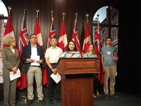 Dr. Kulvinder Gill, at podium, is joined by other medical professionals at Queen's Park on Thursday, May 18, 2017 looking for changes to the province's assisted dying laws. (Kevin Connor/Toronto Sun)