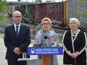 Ontario Premier Kathleen Wynne makes an announcement about high speed rail with London MPP Deb Matthews and transportation minister Steven Del Duca at the Carling Heights Optimist Centre in London. (MORRIS LAMONT, The London Free Press)