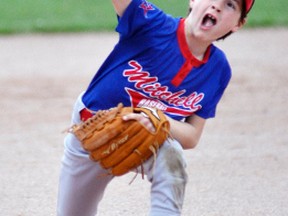 Jordan Visneskie of the Mitchell Mosquito Astros delivers a pitch to the plate during WOBA action against Southwest London last Wednesday, May 17 at Keterson Park.  ANDY BADER/MITCHELL ADVOCATE