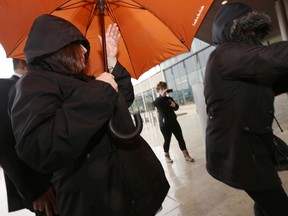 Ontario teacher Jaclyn McLaren (left) arrives at the Quinte Courthouse in Belleville, Ont., on Tuesday March 7, 2017. THE CANADIAN PRESS/Lars Hagberg