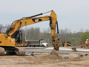 Crews are seen working on the Gateway Project, which will see the construction of a roundabout connecting London, St. Thomas and Port Stanley. (JONATHAN JUHA, Times-Journal)
