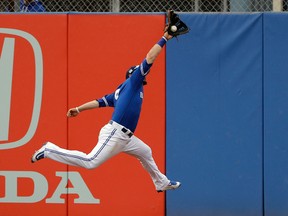 Toronto Blue Jays right fielder Darrell Ceciliani makes a running catch on a fly out by Boston Red Sox's Rafael Devers during a spring training came on March 13, 2017. (AP Photo/Chris O'Meara)