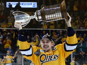 Erie Otters centre Dylan Strome carries the J. Ross Robertson Cup after the Otters won the OHL championship over the Mississauga Steelheads with a 4-3 win in overtime in Game 5 of the OHL hockey final in Erie, Pa., on May 12, 2017. (GREG WOHLFORD / ERIE TIMES-NEWS)
