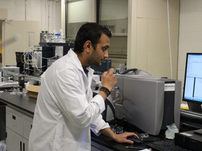 Dhruv Patel runs an experiment at Lambton College's applied research centre. The centre routinely hires students for the research projects done in conjunction with industry. (NEIL BOWEN/Sarnia Observer)