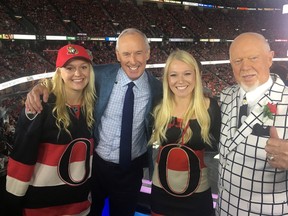 Madison Norman, left, Hockey Night in Canada host Ron MacLean, Kelsie Norman and legendary start of HNIC Don Cherry pose for a photo during a National Hockey League playoff game at Scotiabank Place in Ottawa. (Supplied photo)