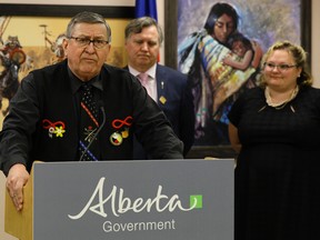 Donald Langford (left), executive director or Metis Child & Family Services Society, speaks at an announcement made by Richard Feehan (middle, Alberta Minister of Indigenous Relations) and Sarah Hoffman (right, Alberta Minister of Health), at the Metis Child & Family Services office in Edmonton on May 19, 2017. Larry Wong / Postmedia