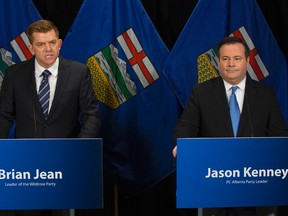 (left to right) Wildrose Party leader Brian Jean and Alberta PC leader Jason Kenney announce that they have reached a deal to merge the parties and create the United Conservative Party, during a press conference in Edmonton Thursday May 18, 2017. Photo by David Bloom