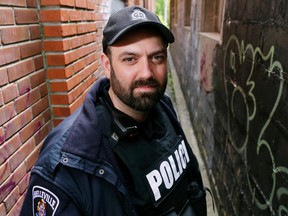 Luke Hendry/The Intelligencer
Belleville Police Const. Jeremy Ashley stands in a downtown alley Friday. He proposed adding people convicted of human trafficking-related offences to the Ontario Sex Offender Registry.