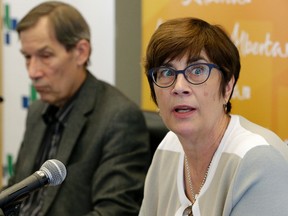 EDMONTON, ALBERTA: APRIL 26, 2016 - Dr. Karen Grimsrud (right/Alberta Chief Medical Officer of Health) and Dr. Gerry Predy (left/Medical Officer of Health, Alberta Health Services) provided an update on sexually transmitted infection rates in Alberta on April 26, 2016 and outlined the programs and services to reach at-risk Albertans. (PHOTO BY LARRY WONG/POSTMEDIA NETWORK)