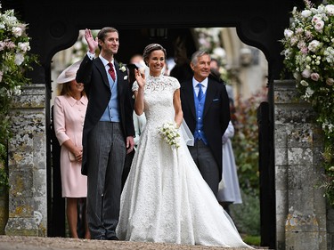 Pippa Middleton and her new husband James Matthews leave church following their wedding ceremony at St. Mark's Church as the bridesmaids and pageboys walk ahead on May 20, 2017 in Englefield Green, England.  (Justin Tallis - WPA Pool/Getty Images)