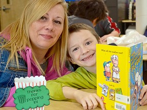 Grade 1 student Bladian Wilson-Chayer and his mom, Tera Wilson-Chayer, read together during the school’s Learn Together Morning program. Photo supplied